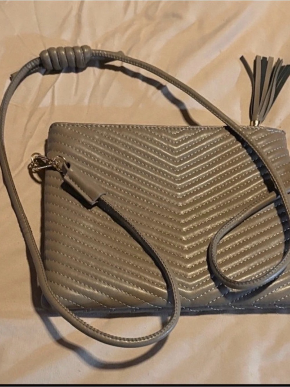 Quilted Chevron Crossbody Bag with Tassel in Gray